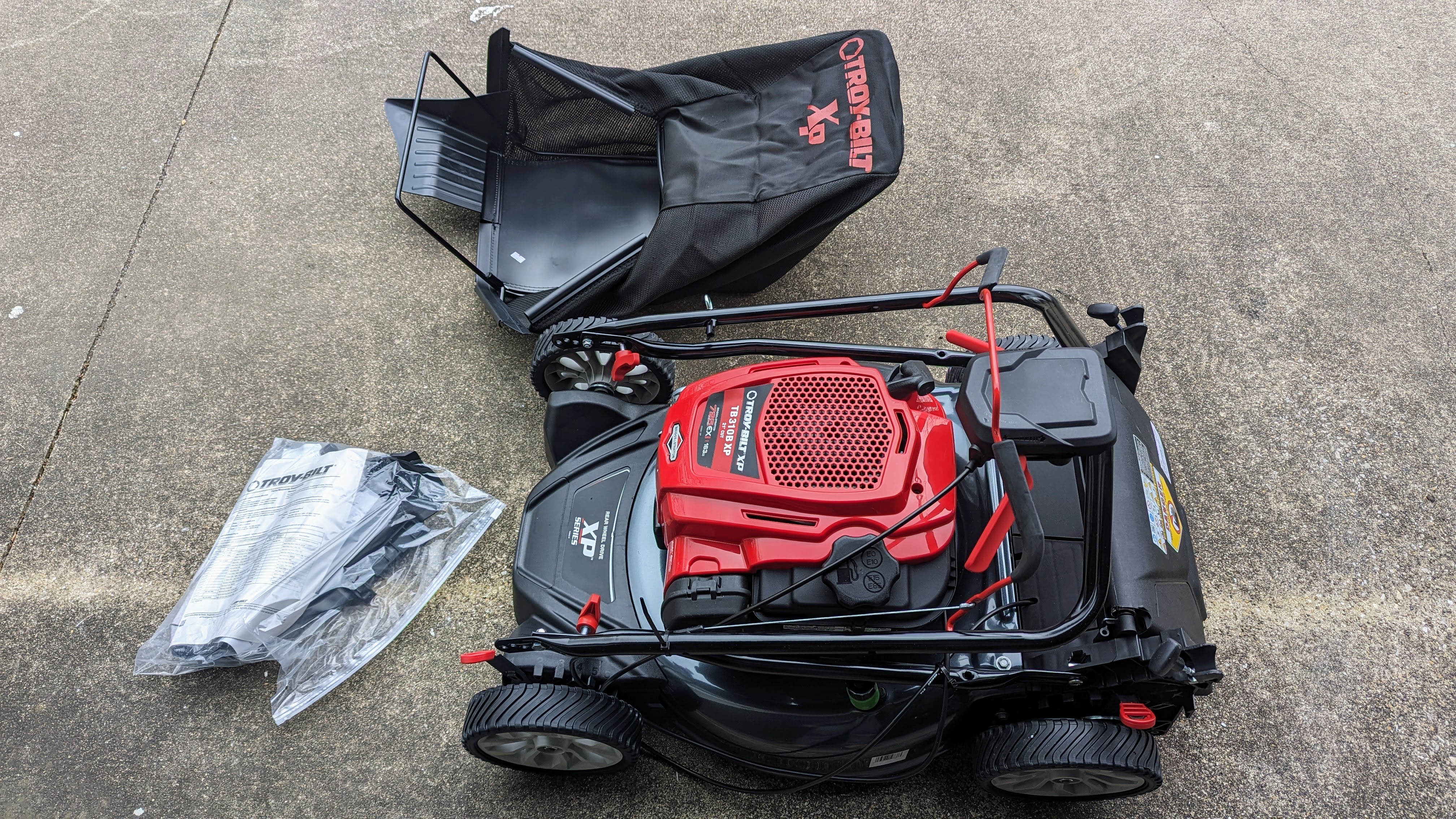 Troy-Bilt TB310B XP 21 in. 163 cc Briggs and Stratton Ready Start Engine 3-in-1 Gas RWD Self Propelled Lawn Mower being tested in writer's yard