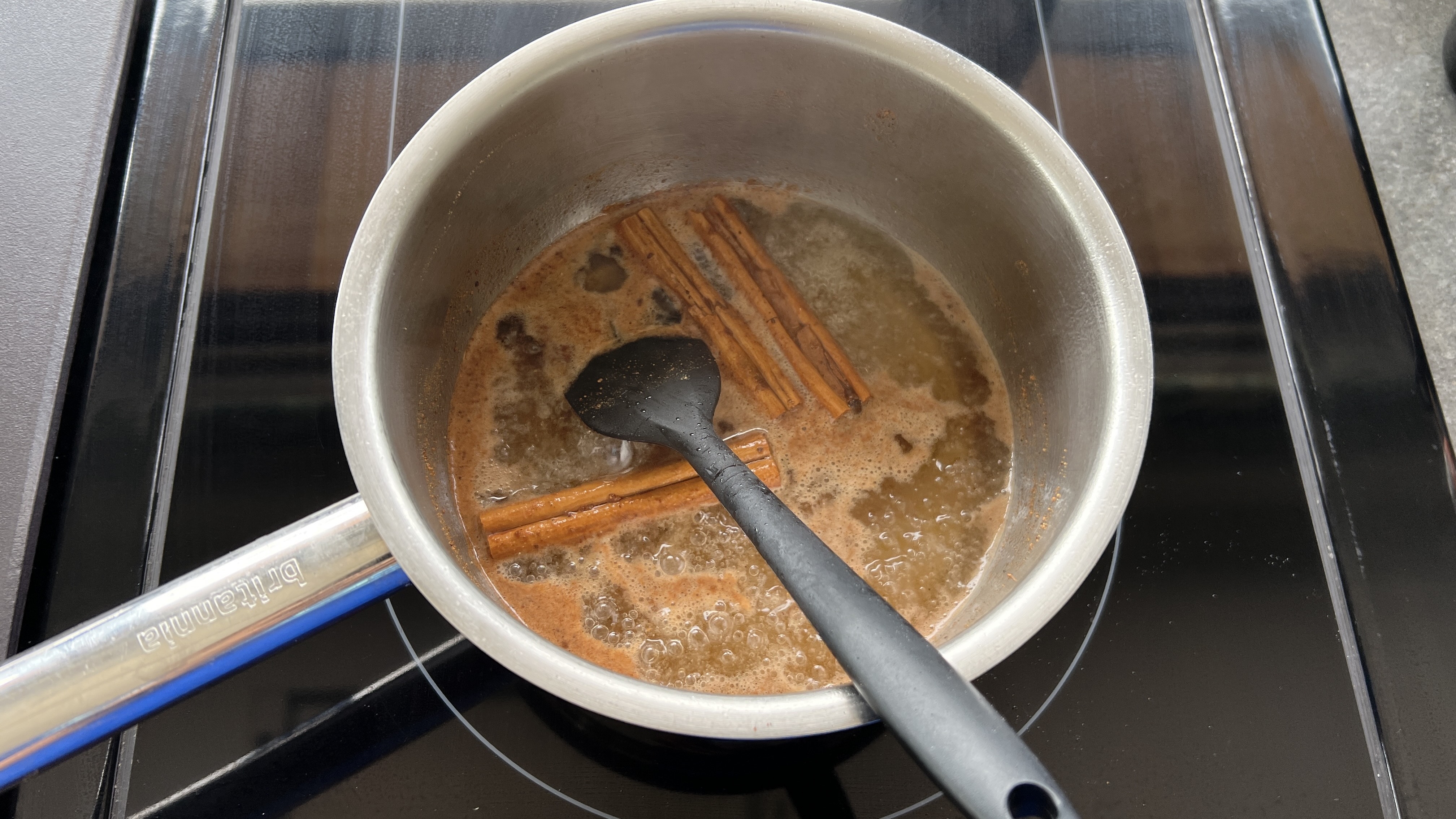 spice syrup in a steel saucepan